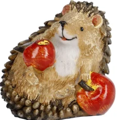 Igel mit zwei Äpfeln, liegend
