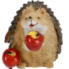 Igel mit zwei Äpfeln, stehend