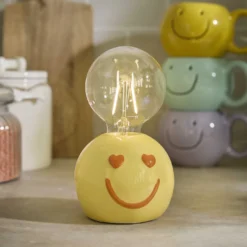 LED-Lampe mit Smiley-Sockel, gelb, 16 cm